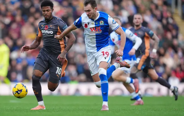 Derby County's Rhian Brewster (left) and Blackburn Rovers' Ryan Hedges battle for the ball