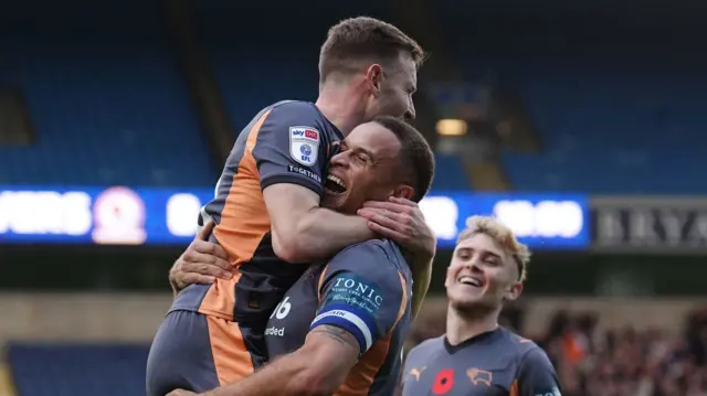Derby County's Carlton Morris (centre) celebrates scoring