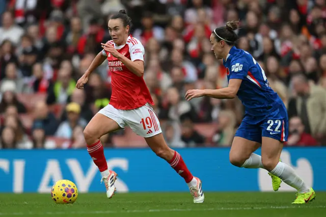 Caitlin Foord of Arsenal is put under pressure by Lucy Bronze of Chelsea during the Barclays Women's Super League match between Arsenal and Chelsea FC at the Emirates Stadium on November 08, 2025 in London, England. (