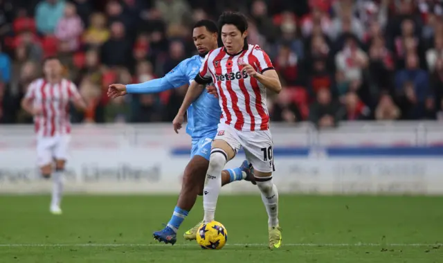 Bae Jun-Ho of Stoke City and Milan van Ewijk of Coventry