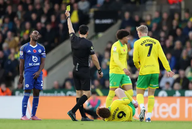 Leicester City's Ricardo Pereira receives a yellow card