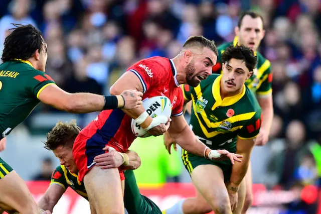 Mike McMeeken of England takes the ball into contact