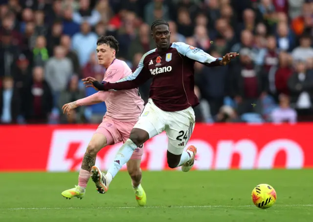 Description Bournemouth's Alex Jimenez (left) and Aston Villa's Amadou Onana battle for the ball during the Premier League match at Villa Park, Birmingham.