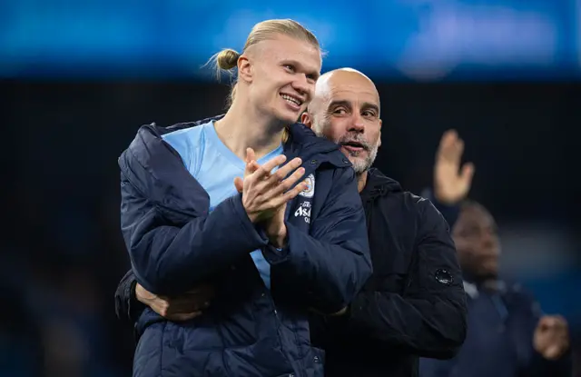 Erling Haaland and Pep Guardiola laughing