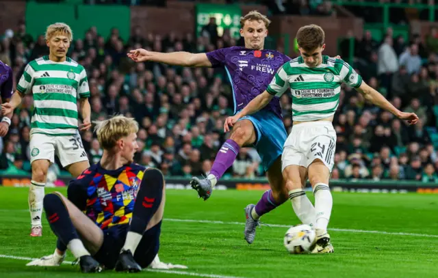 Celtic's Johnny Kenny (right) scores