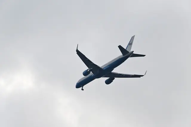 Air Force One flies over the Washington Commanders stadium