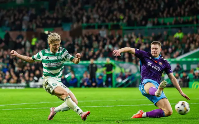 Celtic's Daizen Maeda (left) scores