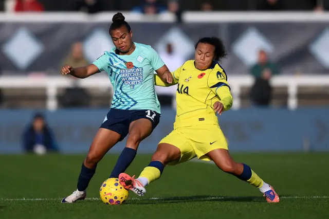 Nikita Parris of London City Lionesses is challenged by Drew Spence of Tottenham Hotspur