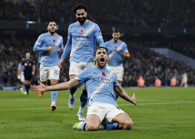 Manchester City's Nico Gonzalez celebrates scoring their second goal with Manchester City's Josko Gvardiol