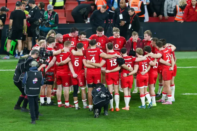 Wales in a huddle after the match