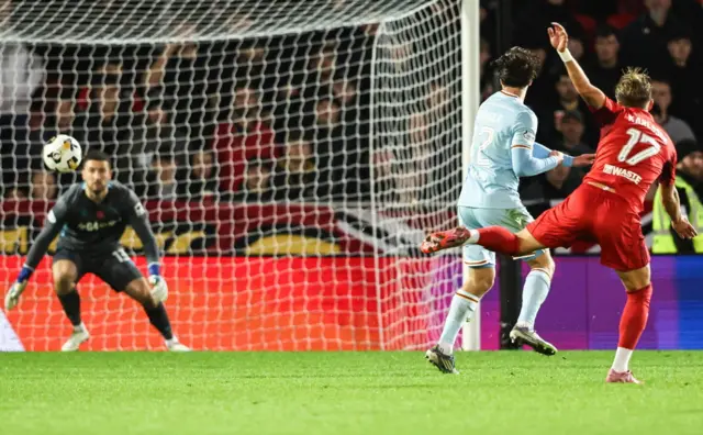 Aberdeen's Jesper Karlsson scores