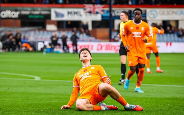 Rangers' Mikey Moore celebrates