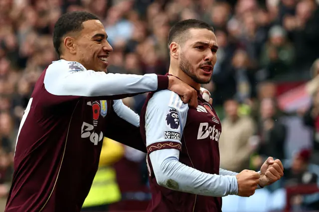 Emiliano Buendia of Aston Villa celebrates scoring his team's first goal with teammate Morgan Rogers during the Premier League match between Aston Villa and Bournemouth at Villa Park on November 09, 2025 in Birmingham, England.