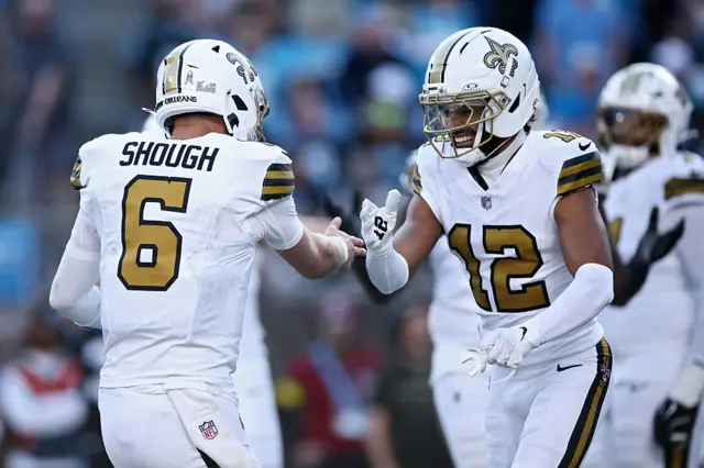 Tyler Shough and Chris Olave