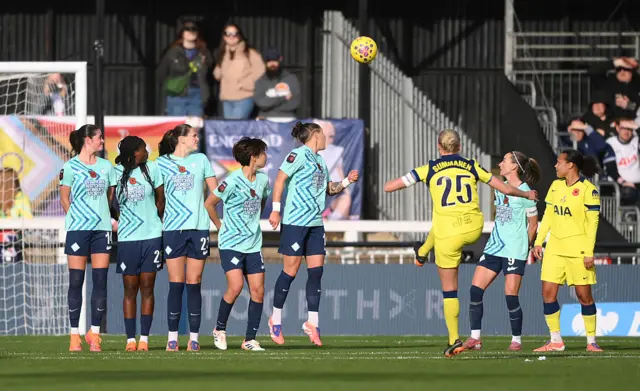 The players of London City Lionesses watch on in the defensive wall as Eveliina Summanen of Tottenham Hotspur scores her team's second goal from a direct free-kick during the Barclays Women's Super League match between London City Lionesses and Tottenham Hotspur at Copperjax Community Stadium on November 09, 2025 in Bromley, England.