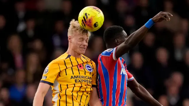 Description Brighton and Hove Albion's Jan Paul van Hecke heads the ball during the Premier League match at Selhurst Park, London.