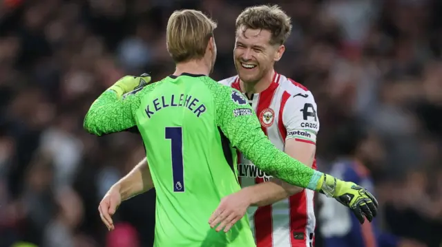 Brentford's Nathan Collins and Brentford's Caoimhin Kelleher celebrate their third goal scored by Brentford's Igor Thiago.