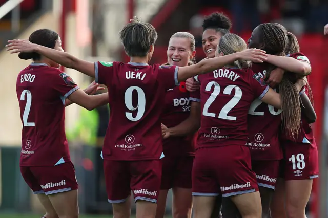 : Shekiera Martinez of West Ham United celebrates with teammates after scoring a goal to make it 1-0 during the Barclays Women's Super League match between West Ham United and Leicester City at Chigwell Construction Stadium