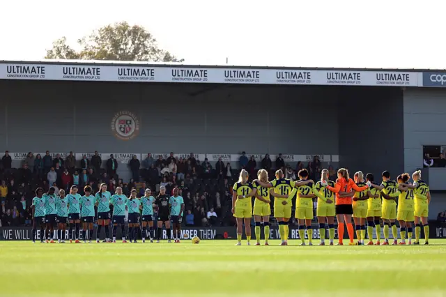 The players of London City Lionesses and Tottenham Hotspur pause for a minutes' silence in honour of Remembrance Day prior to kick-off ahead of the Barclays Women's Super League match between London City Lionesses and Tottenham Hotspur at Copperjax Community Stadium on November 09, 2025 in Bromley, England.