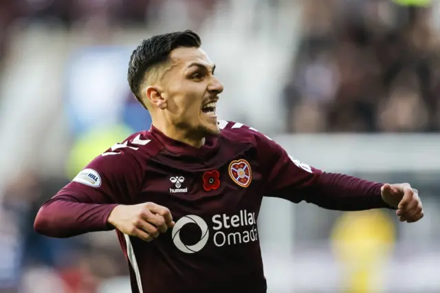 Hearts' Alexandros Kyziridis celebrates after scoring to make it 1-0 during a William Hill Premiership match between Heart of Midlothian and Dundee United at Tynecastle Park,