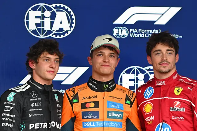 Kimi Antonelli, Lando Norris and Charles Leclerc pose for photos after qualifying