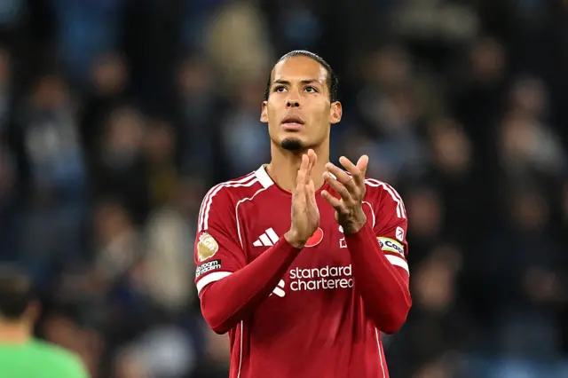 Virgil van Dijk of Liverpool applauds the fans after the Premier League match between Manchester City and Liverpool at Etihad Stadium on November 09, 2025 in Manchester, England.