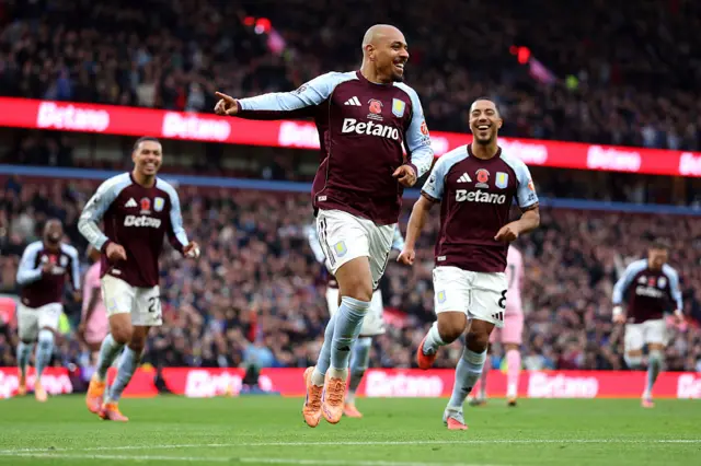 Donyell Malen of Aston Villa celebrates scoring his team's fourth goal during the Premier League match between Aston Villa and Bournemouth at Villa Park on November 09, 2025 in Birmingham, England.