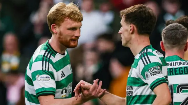Celtic's Liam Scales and Johnny Kenny celebrate