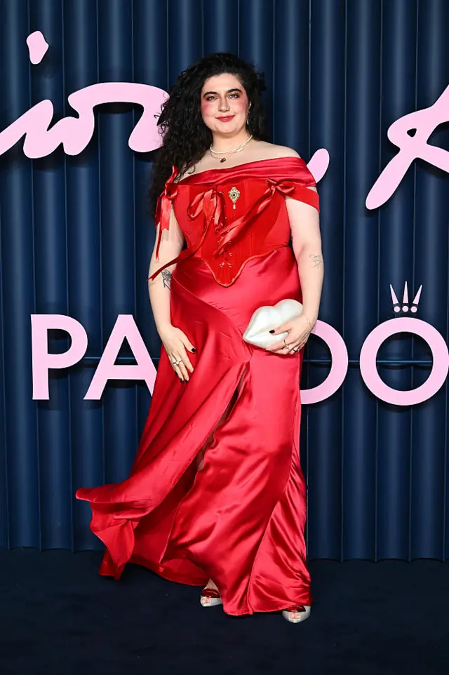 Anastasia Vartanian, wears Haus Dahlia long red corset dress