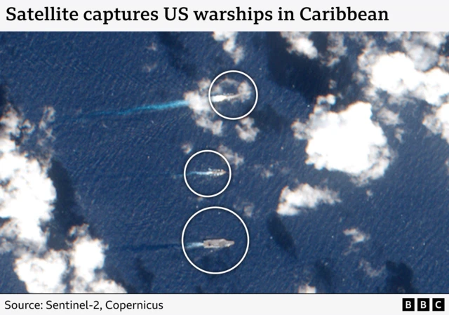 BBC annotation of satellite imagery from the Sentinel-2 satellite showing three US ships steaming three abreast with the aircraft carrier USS Gerald R Ford circled at the bottom