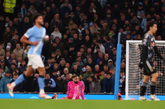 Gianluigi Donnarumma of Manchester City goes down injured