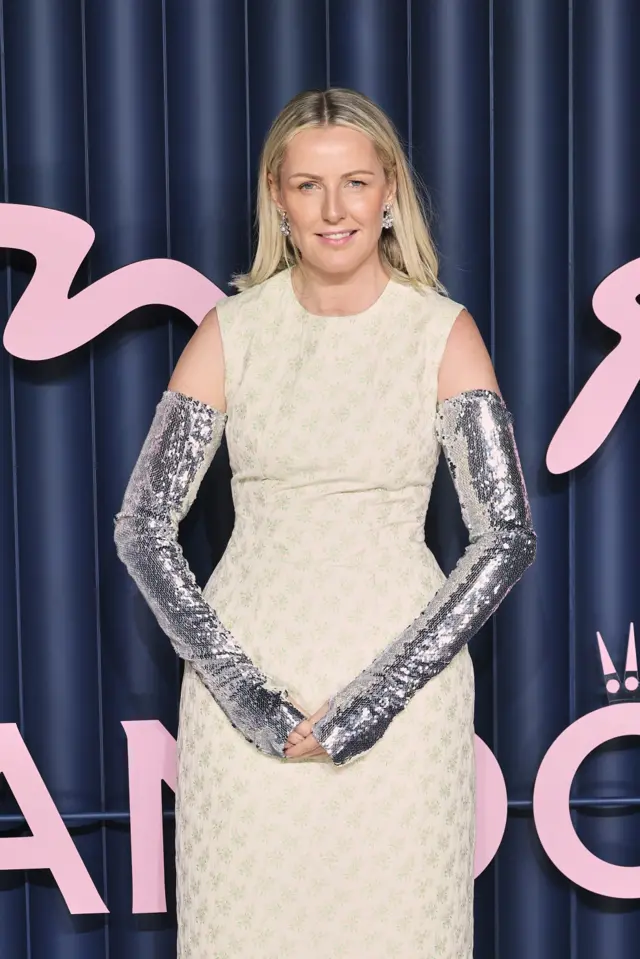 Laura Weir wears silver sequinned gloves