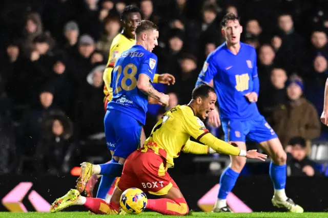 Birmingham City forward Jay Stansfield (28) fouls Watford forward Tom Ince (7)