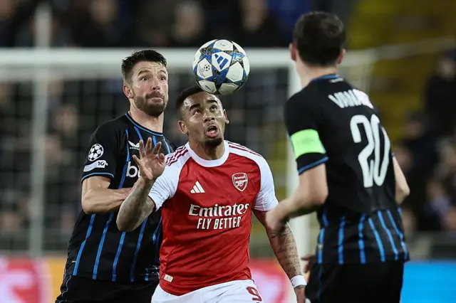 Club's Brandon Mechele and Arsenal's Gabriel Jesus fight for the ball