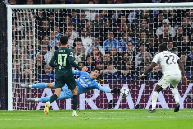 Courtois dives to make a save