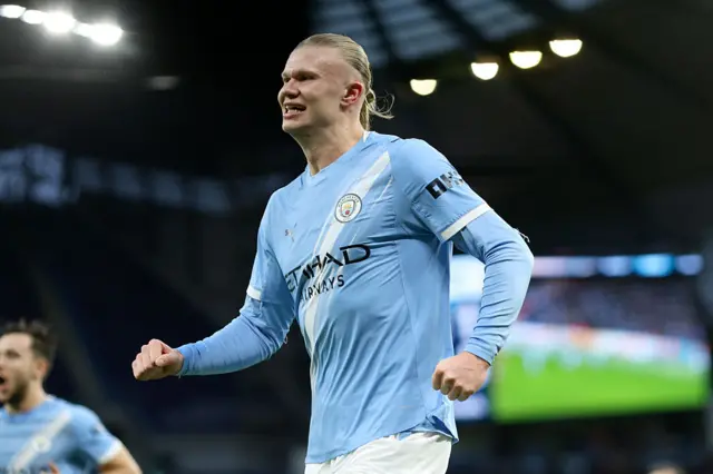 Erling Haaland celebrates for Man City