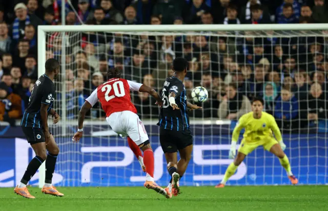 Madueke strikes the ball
