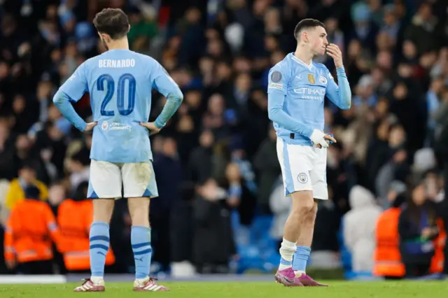 Manchester City look disappointed