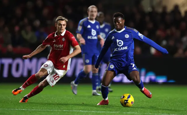 Scott Twine of Bristol City battles with Abdul Fatawu of Leicester City