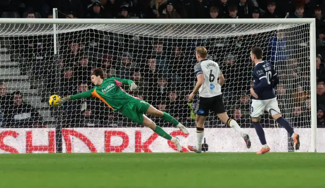 Jacob Widell Zetterstrom, goalkeeper of Derby County makes a save