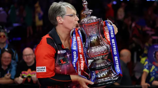 Lisa Ashton holds the Women's World Matchplay trophy