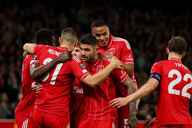 The Reds celebrate after Nikola Milenkovic of Nottingham Forest scores a goal
