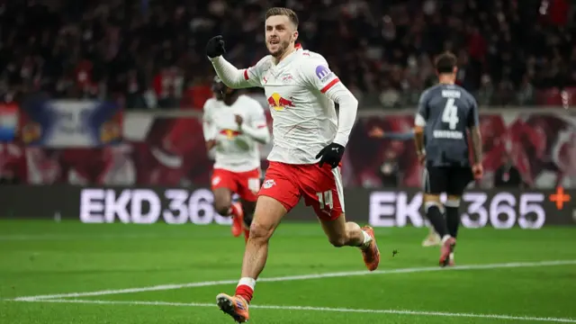 LEIPZIG, GERMANY - DECEMBER 06: Christoph Baumgartner of RB Leipzig celebrates scoring his team's second goal during the Bundesliga match between RB Leipzig and Eintracht Frankfurt at Red Bull Arena on December 06, 2025 in Leipzig, Germany. (Photo by Maja Hitij/Getty Images)