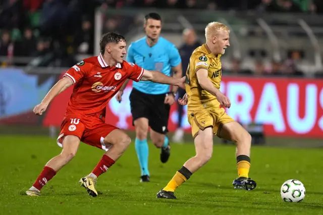 Shelbourne's John Martin (left) and Crystal Palace's Will Hughes battle for the ball during the UEFA Conference League match at the Tallaght Stadium, Dublin