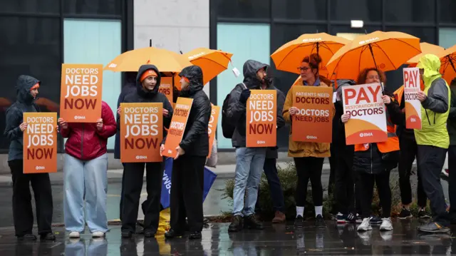 Resident doctors picket outside the Royal Liverpool University Hospital in Liverpool, 14 November 2025.