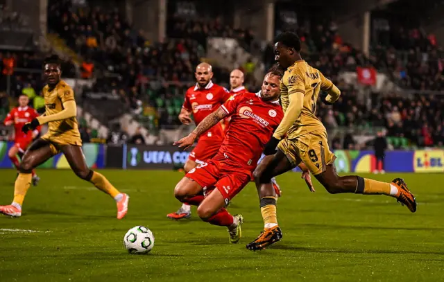 Eddie Nketiah of Crystal Palace in action against Paddy Barrett of Shelbourne during the UEFA Conference League 2025/26 league phase match between Shelbourne and Crystal Palace at Tallaght Stadium in Dublin.