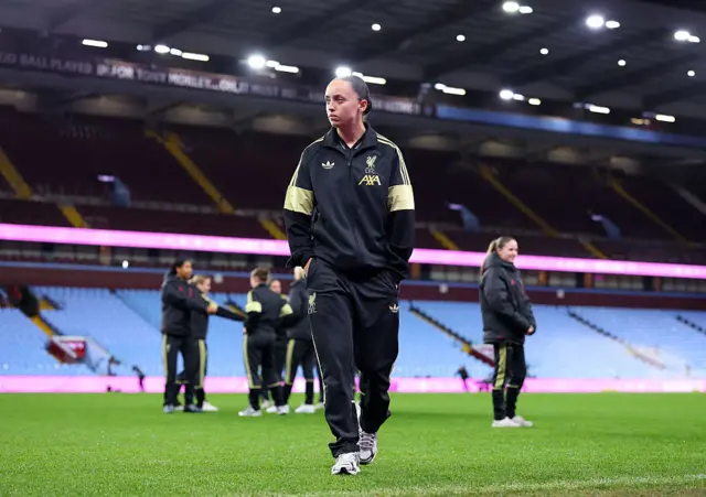 Mia Enderby of Liverpool inspects the pitch prior to the Barclays Women's Super League match between Aston Villa and Liverpool at Villa Park on December 11, 2025 in Birmingham, England.