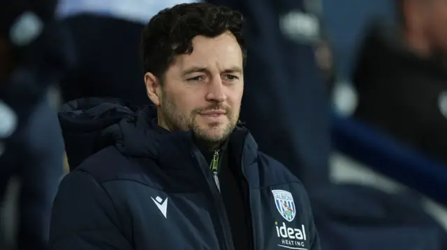 Ryan Mason on the touchline