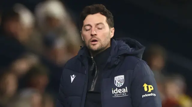 A dejected looking West Brom boss Ryan Mason