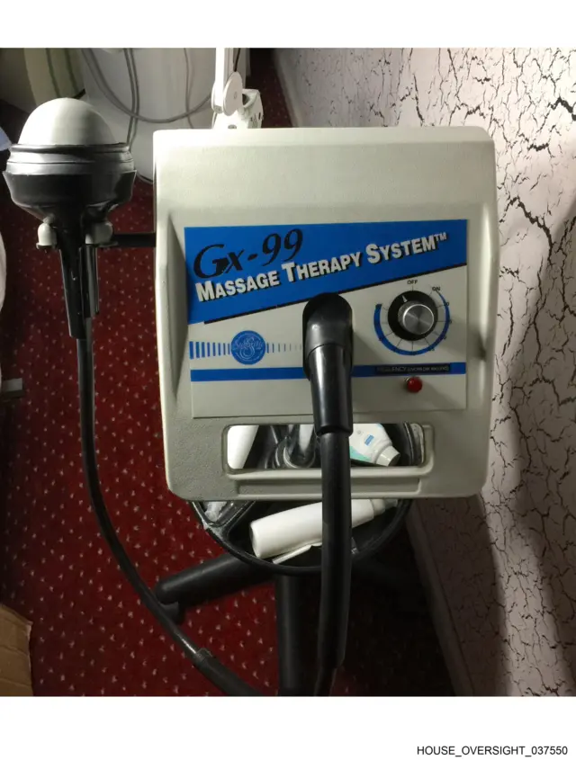 A machine with the words massage therapy system